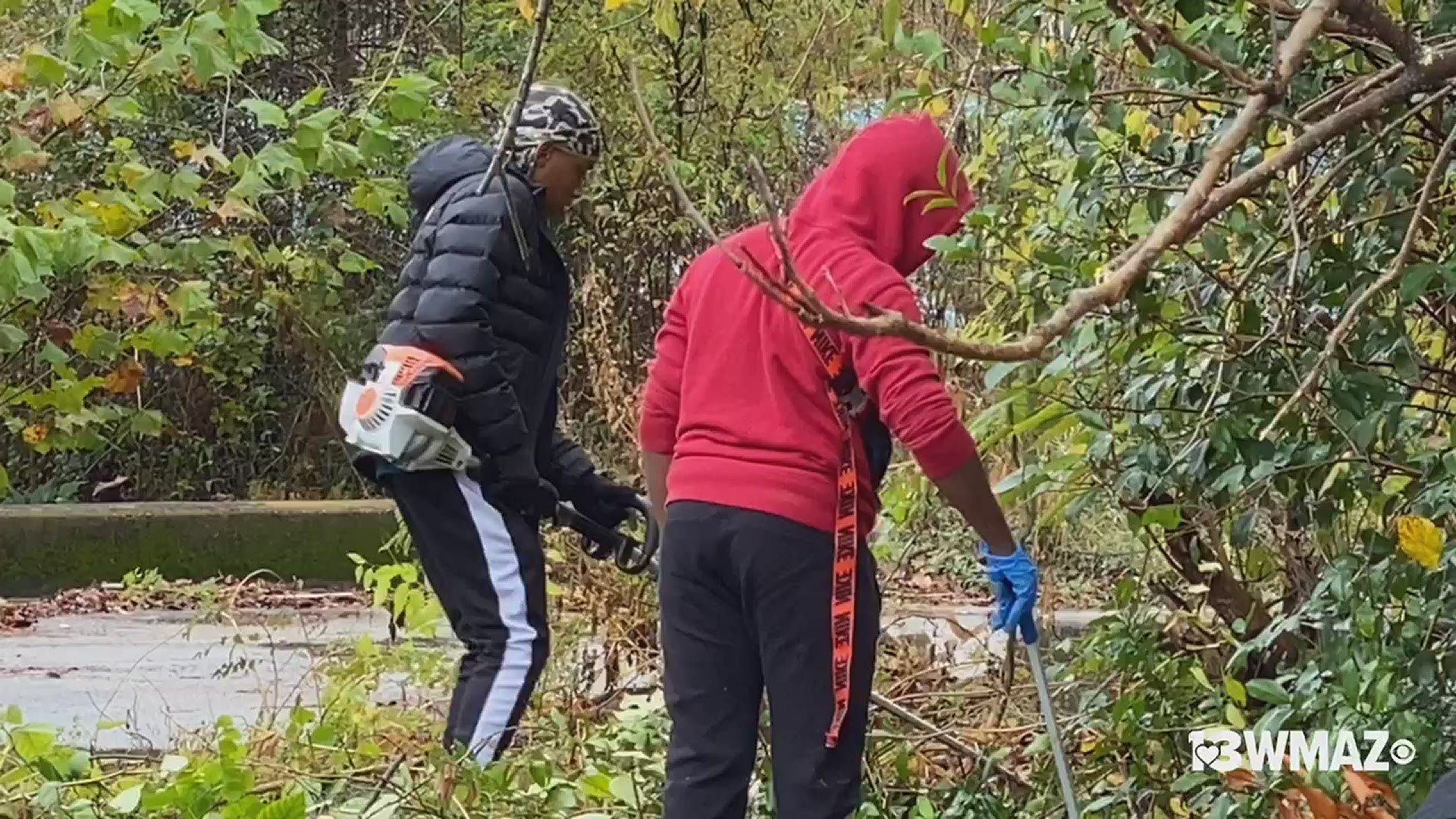 The community came together Saturday to clean Greenwood Bottom neighborhood.