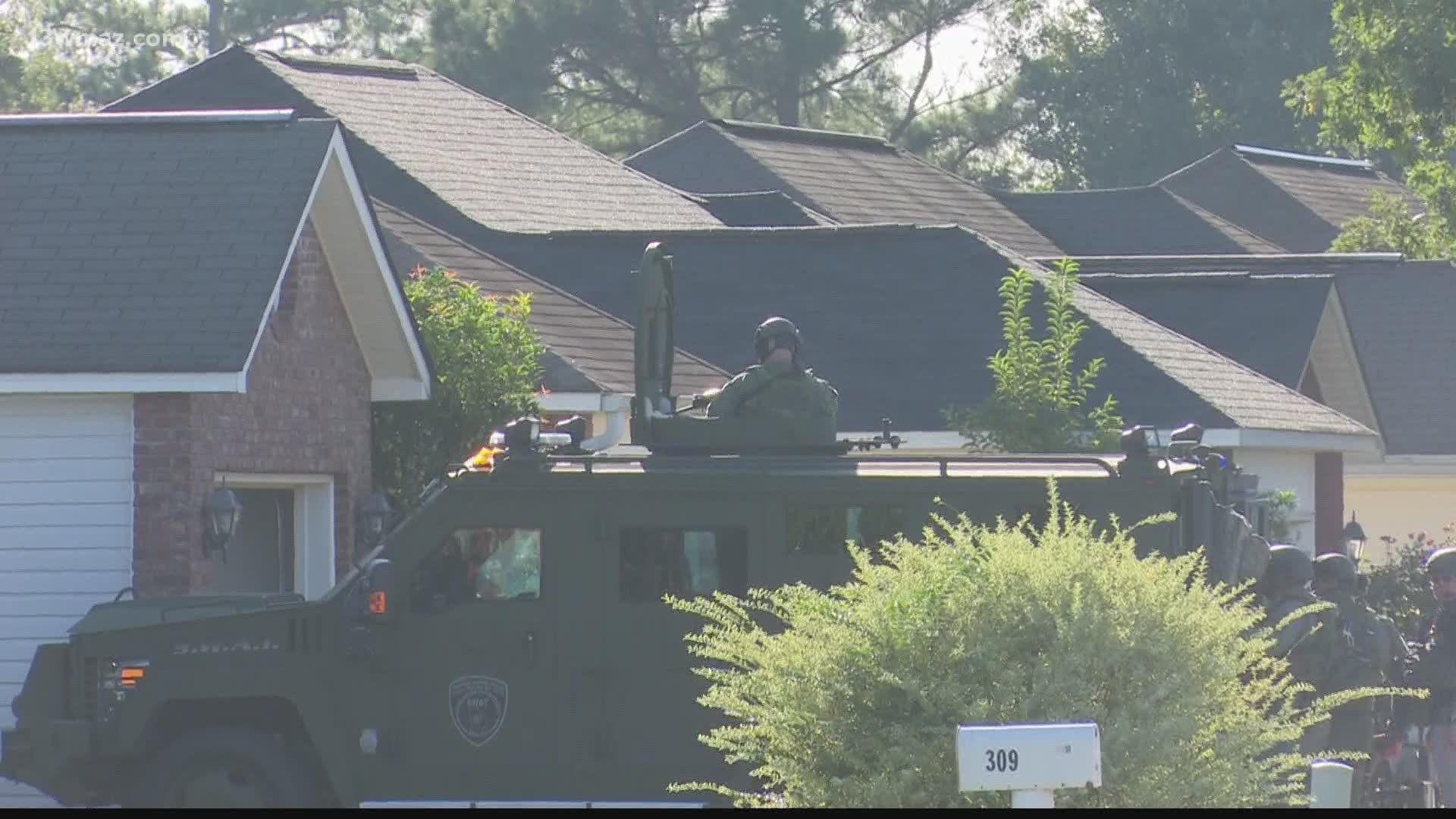 A standoff in Warner Robins ended after more than two hours Warner Robins Police's SWAT Team stood outside a home on Tyson Glen Drive after a shot was fired.