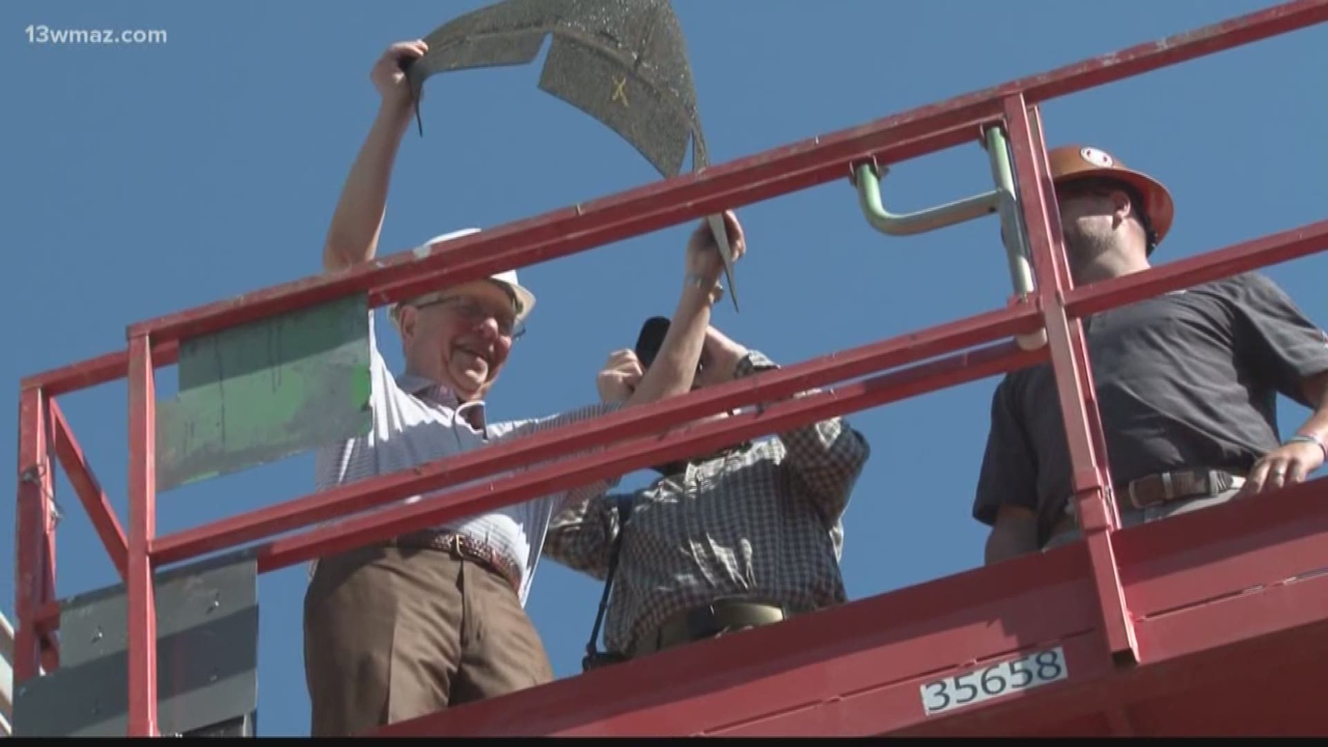 On Tuesday, roofing CEO Melvin Kruger had more than the standard birthday celebration. For his 90th, Kruger got to remove the first shingle from the roof of Navicent Health's retirement community Carlyle Place.