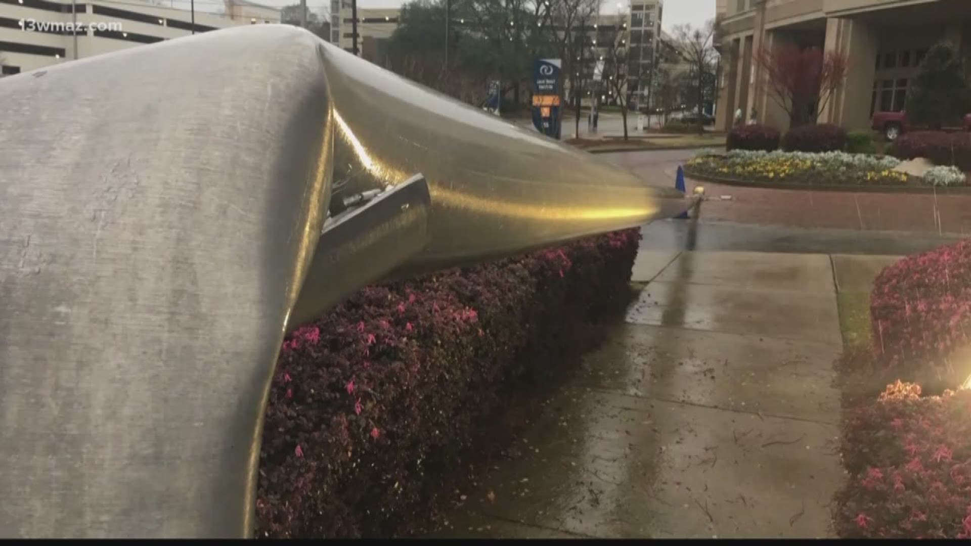 Trees were toppled, signs were flipped and cars moved in downtown Macon after a strong storm came through the area. Joshua White captured the storm roaring through the downtown area in a now 'viral' video.