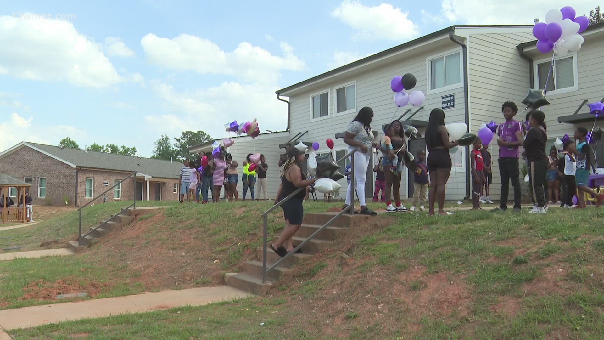 Nearly 50 people gathered to honor the life of Kaneza Owens. They raised purple balloons in honor of domestic violence victims.