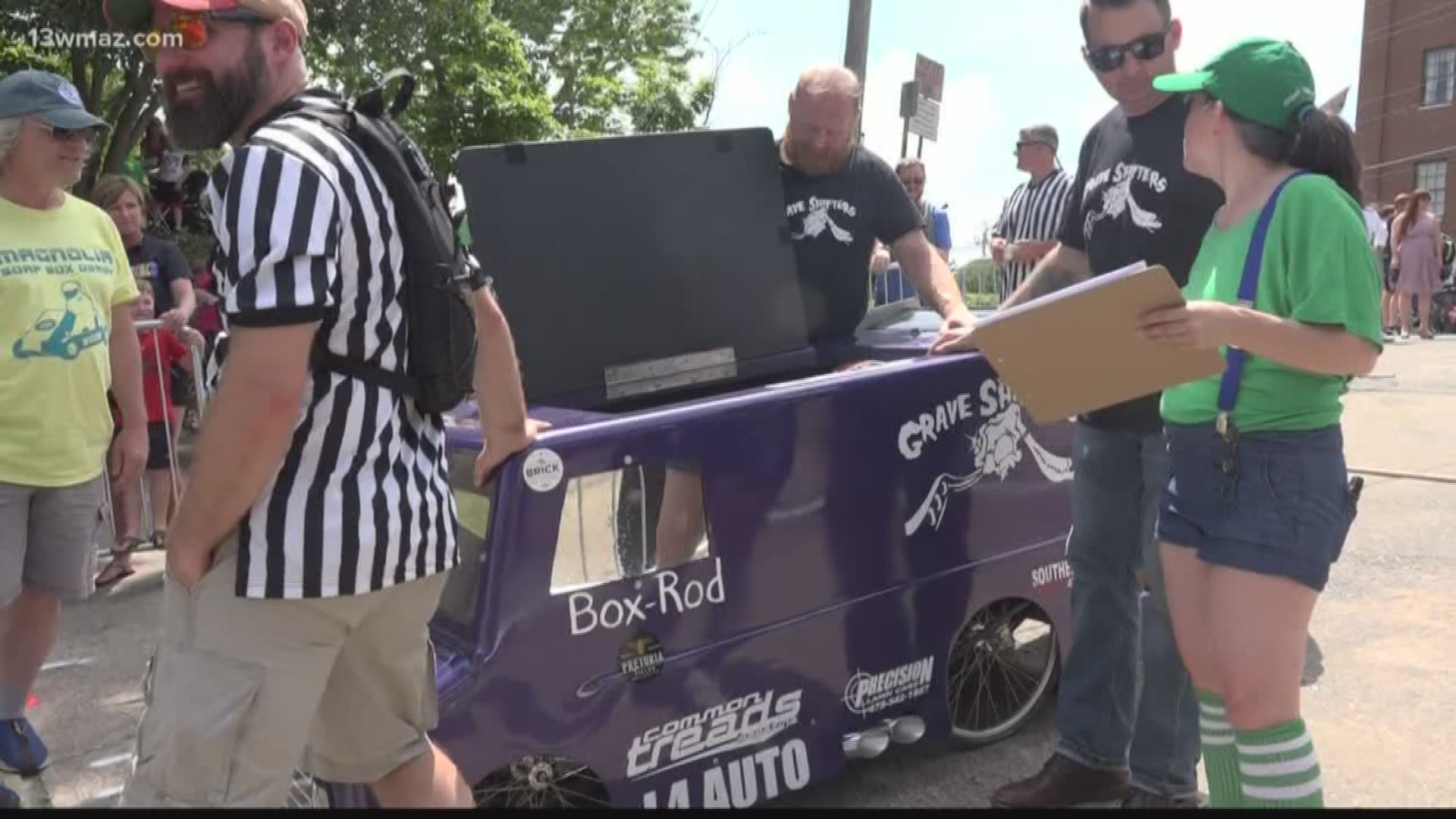 People gathered on Magnolia Street in Macon near Washington Park on Saturday to watch soap boxes speed down the hill. The family-friendly event also hosted several food trucks and vendors.