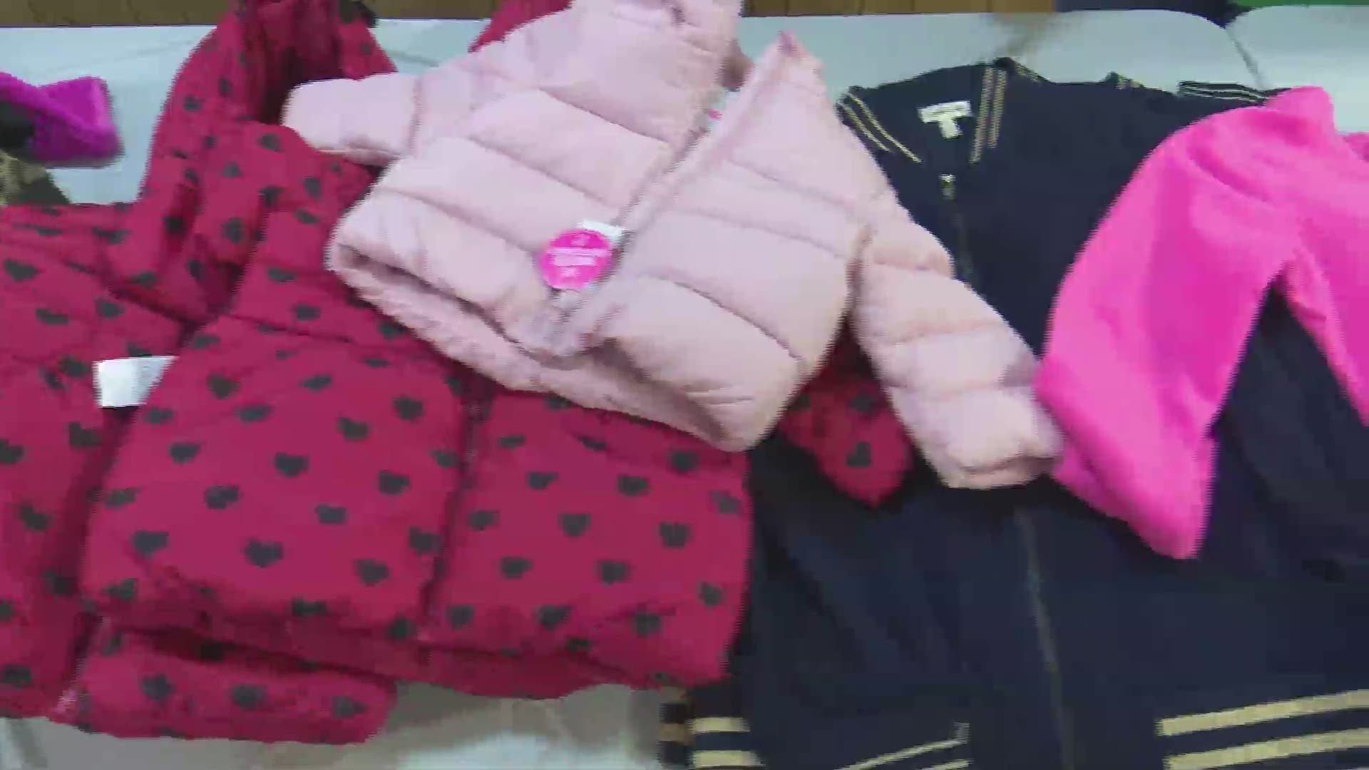 Cozy Kidz gave away 200 new coats and over 100 pairs of shoes to children in need on Saturday.