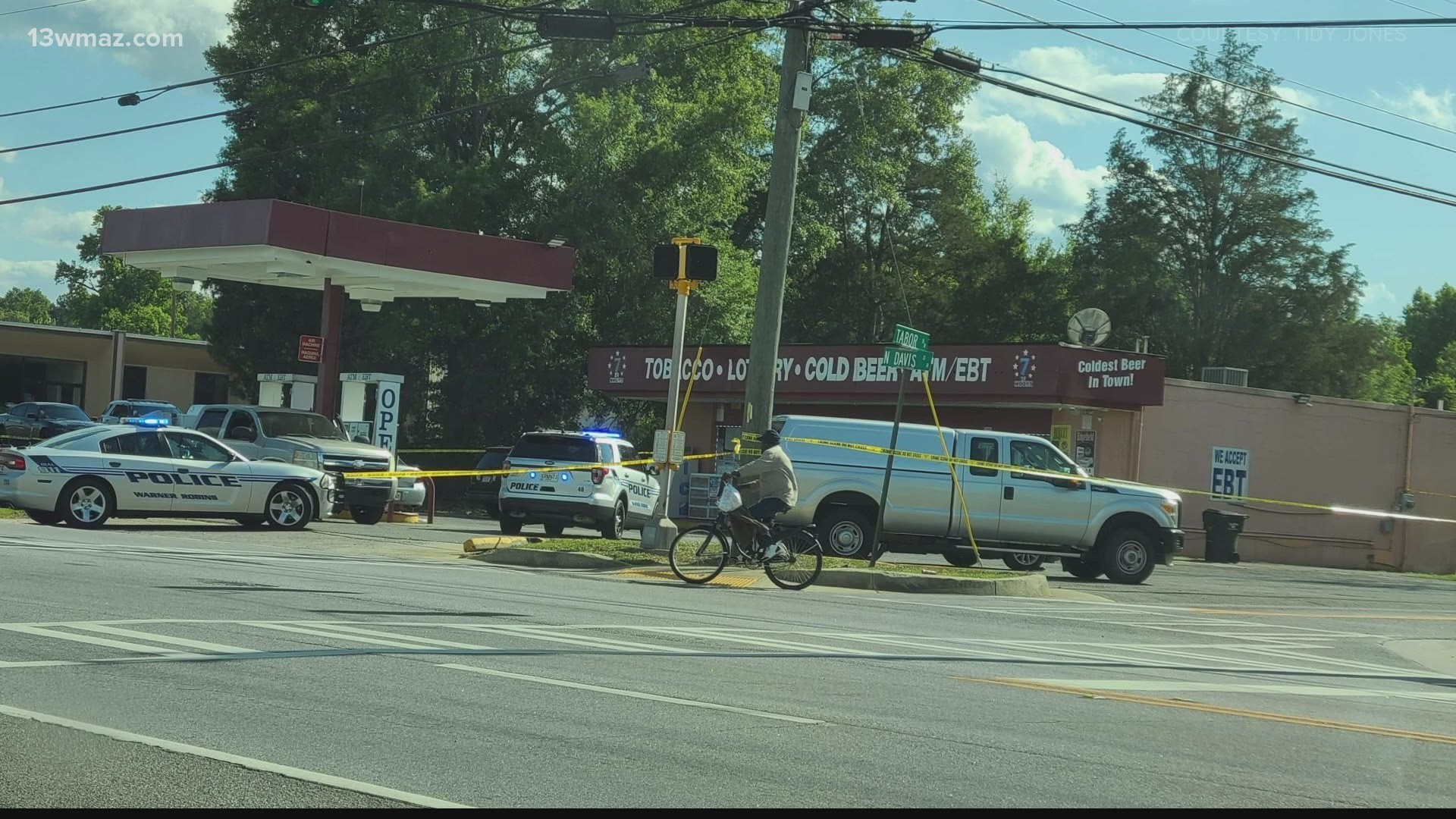 A woman was hospitalized late Friday afternoon after a shooting at a convenience store in Warner Robins.