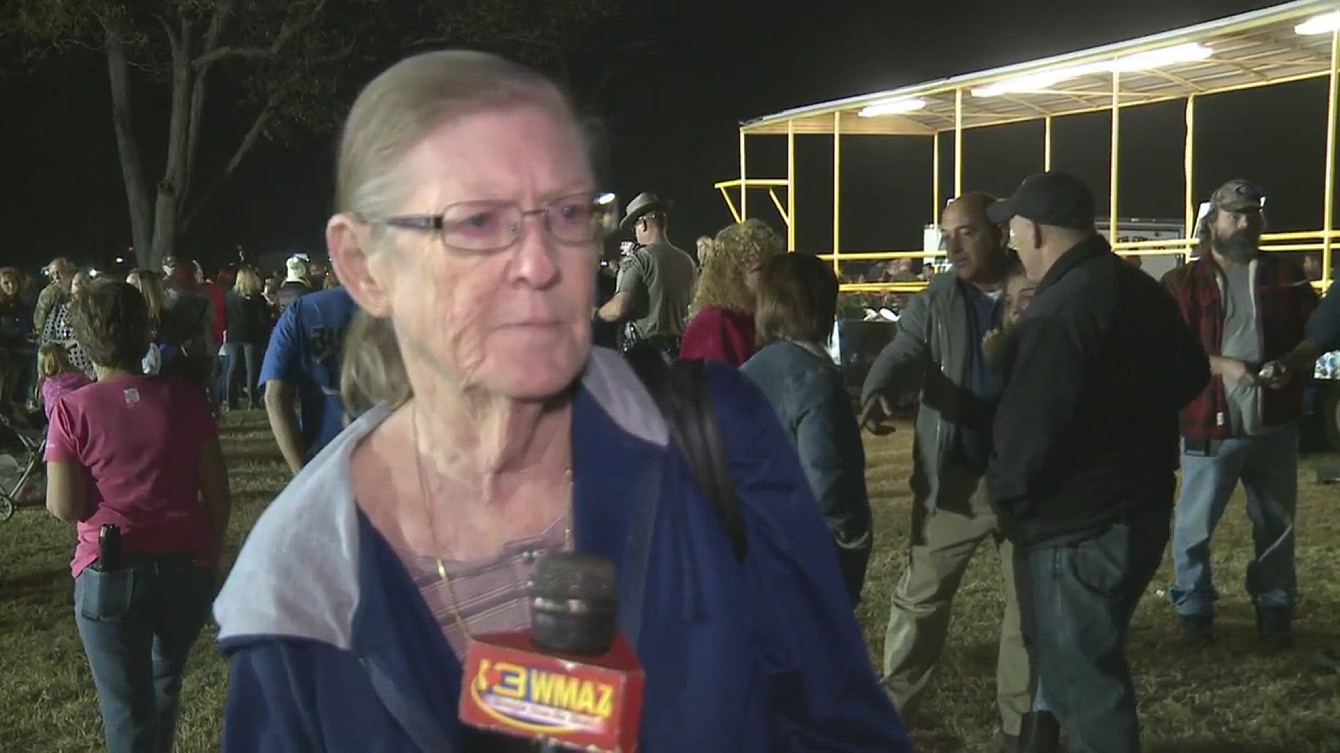 Patricia Sondron, the mother of fallen Peach Co. deputy Sgt. Patrick Sondron talks about her son after a candlelight vigil Tuesday. Sgt. Sondron and Deputy Daryl Smallwood were both shot and killed Sunday responding to a call in Byron.