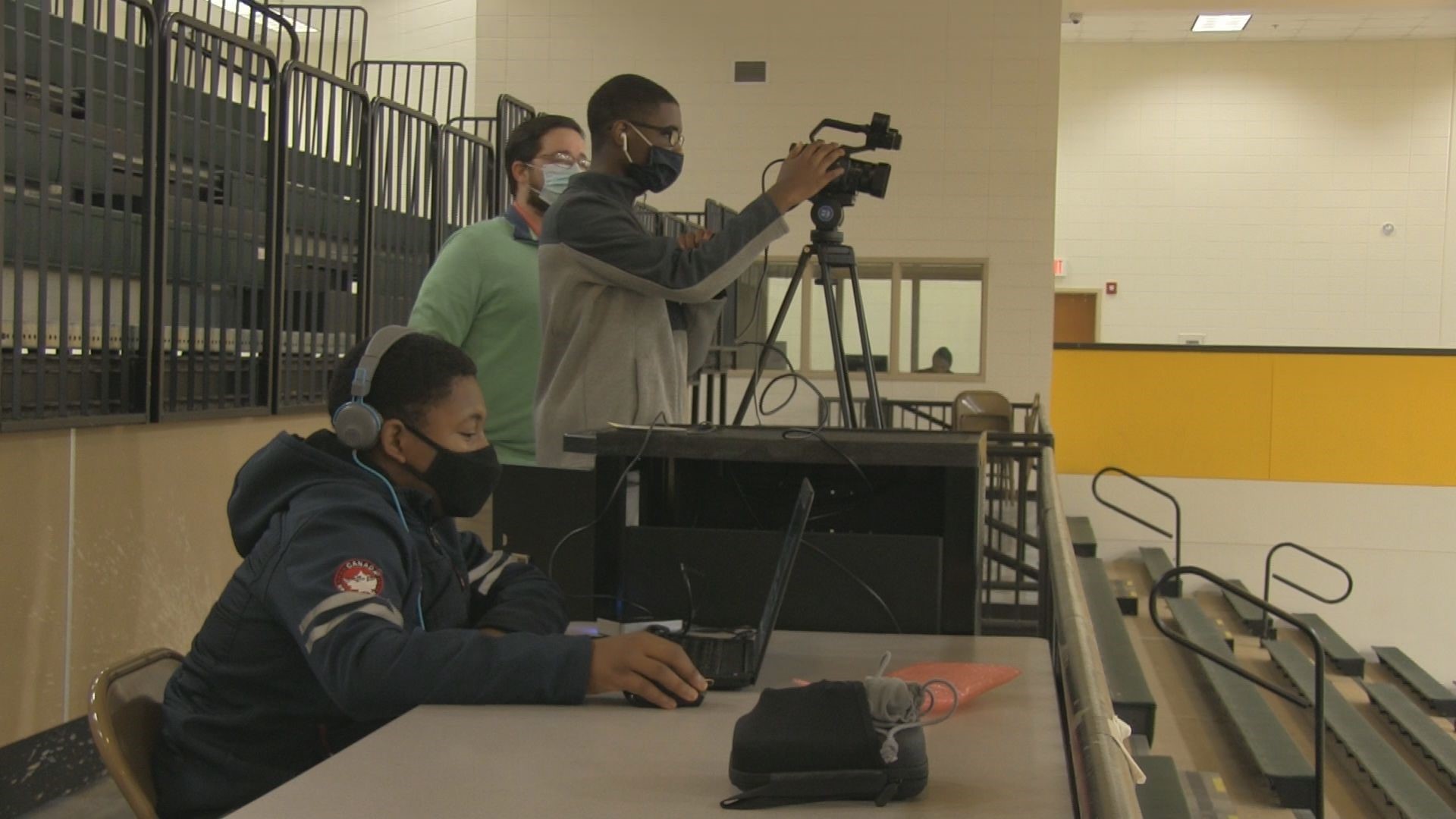 A student-run production crew launched a live streaming broadcast of all the high school basketball games for people to watch from home