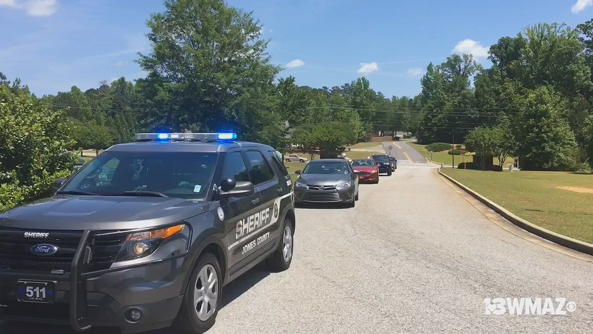 Led by a sheriff’s deputy cruiser, dozens of Jones Countians drove up to the Stone Brooke Suites to wish Helen Kilgore a happy birthday.