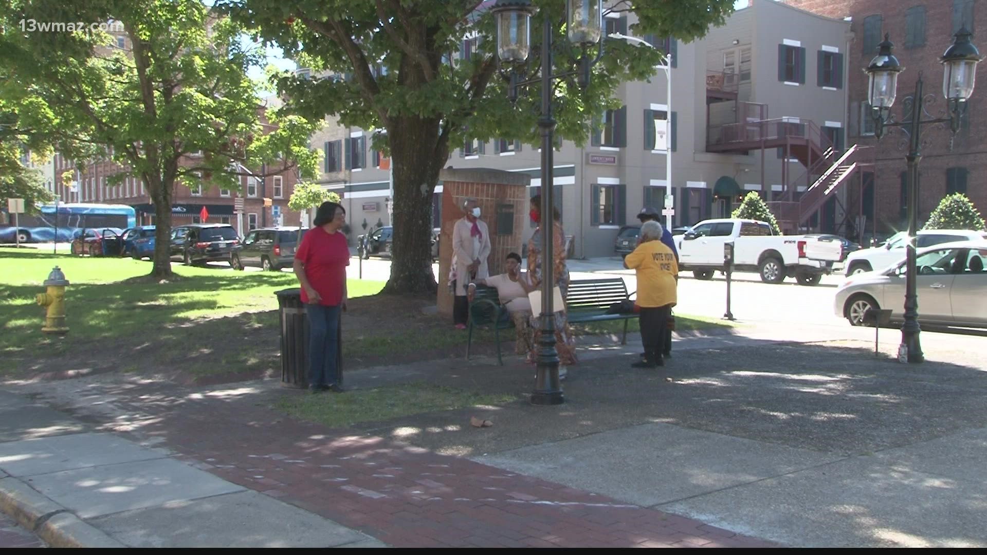 Members of the Macon NAACP chapter met in the city’s downtown Friday to speak out against what they believe are unfair practices against tenants in the area.