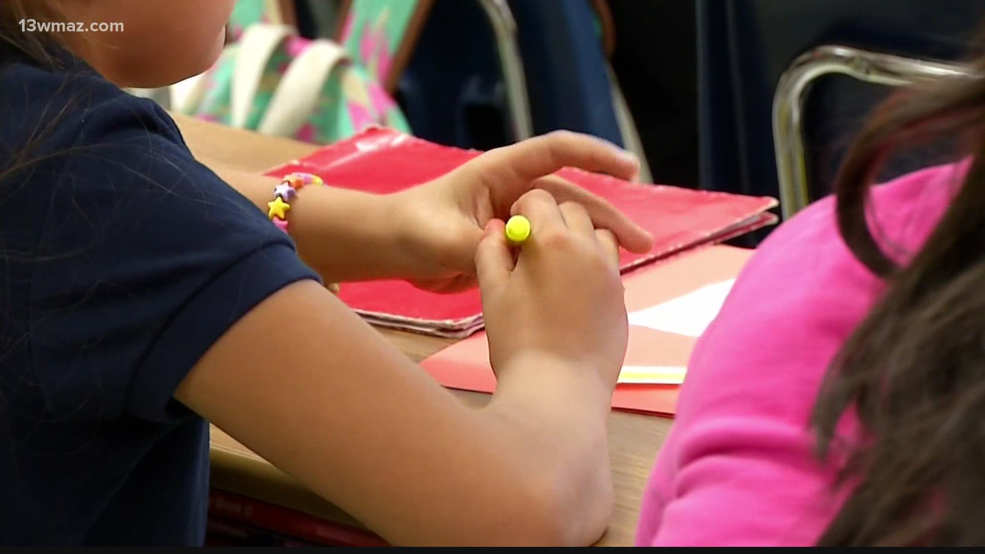 Some children will be in the classroom possibly with masks on, and some will be doing online learning at home.