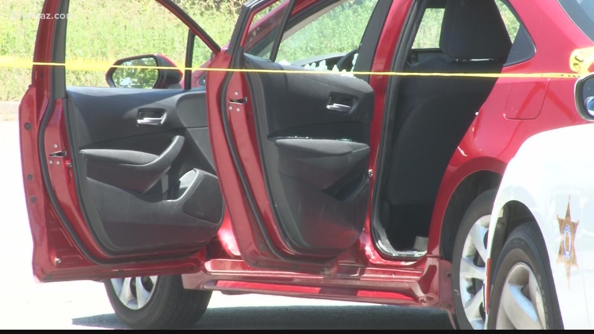 Two women and two children were inside the car at the time. It is unclear whether anyone was injured in the shooting.