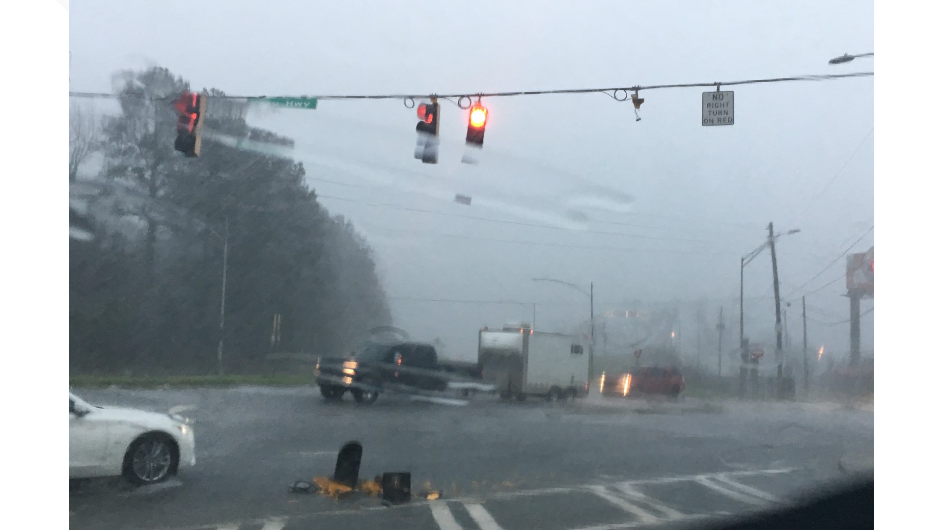 Heavy rainfall during a round of severe weather caused Gray Highway flood and wind took down a traffic light at Gray and Clinton