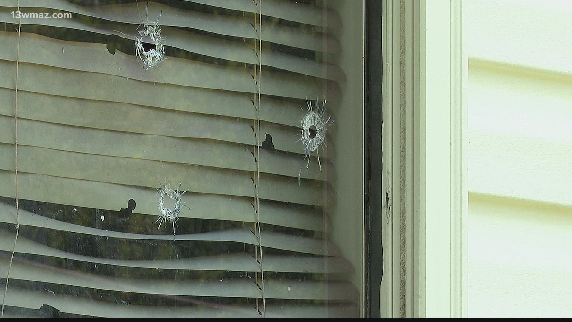 The Bibb County Sheriff's incident report says gunfire hit the home 13 times, but they recovered 29 shell casings in front of the home from a semiautomatic weapon.