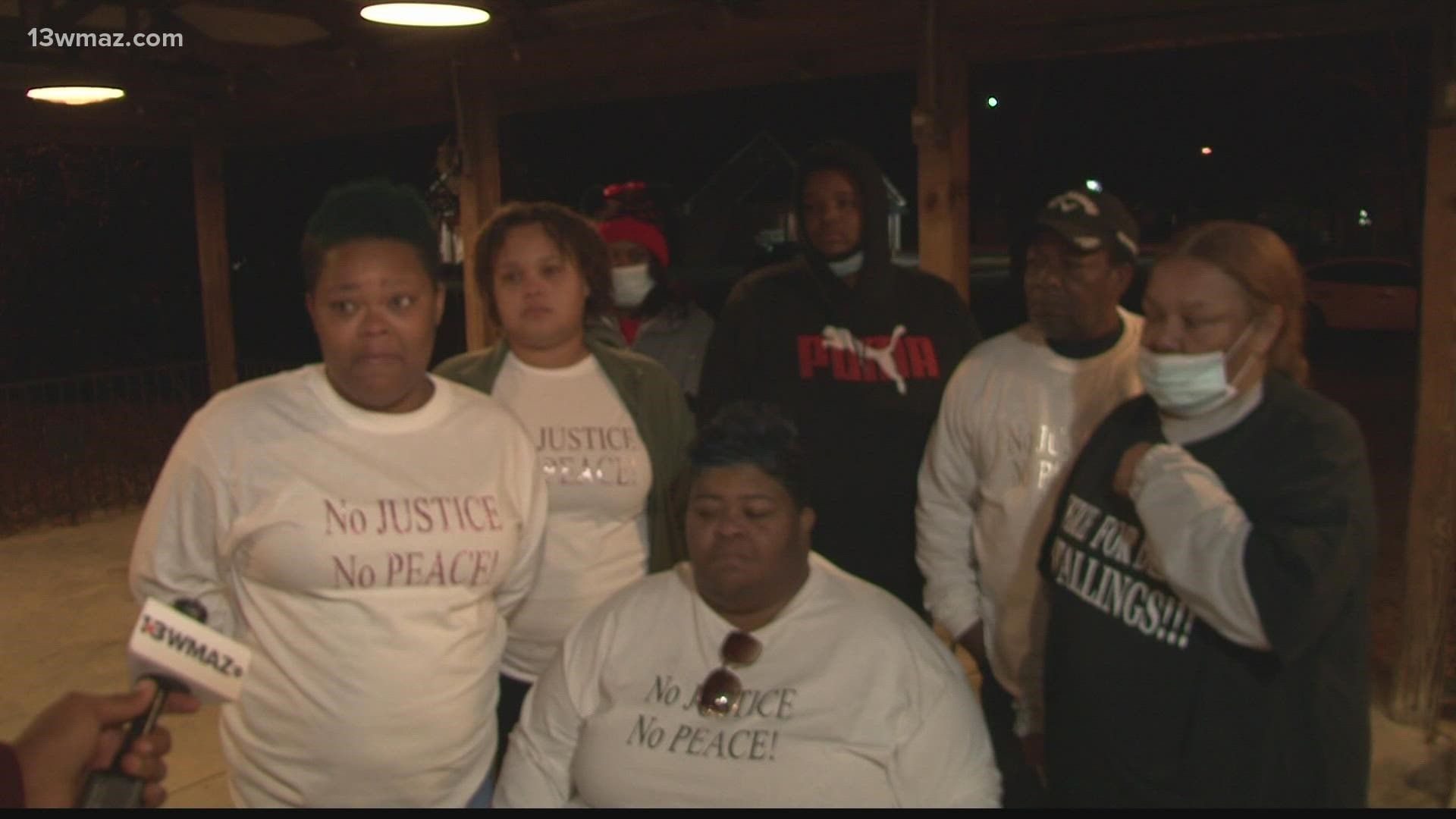 About 50 people gathered Friday night to remember Denrick Stallings, who was shot and killed by a Crawford deputy during a traffic stop