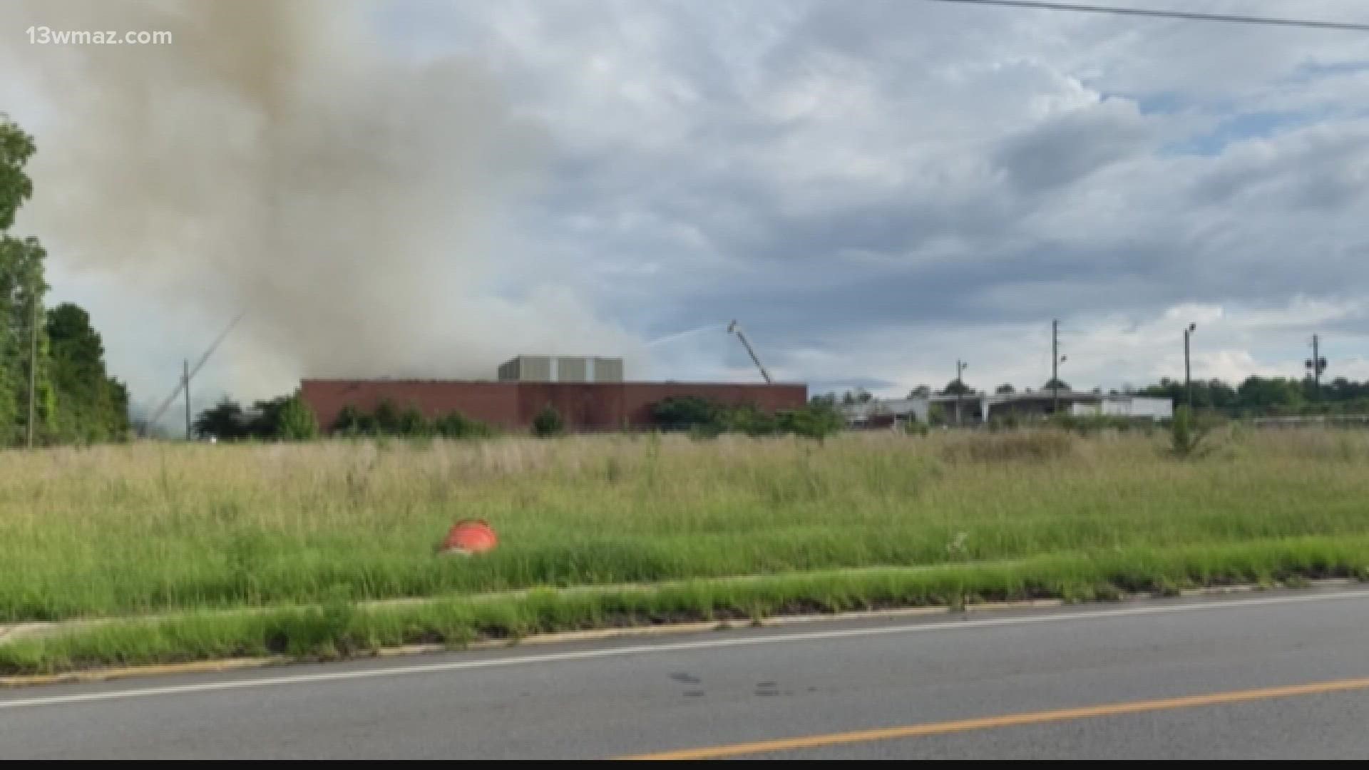 The flames burned through the roof of the vacant building and caused a structural collapse.