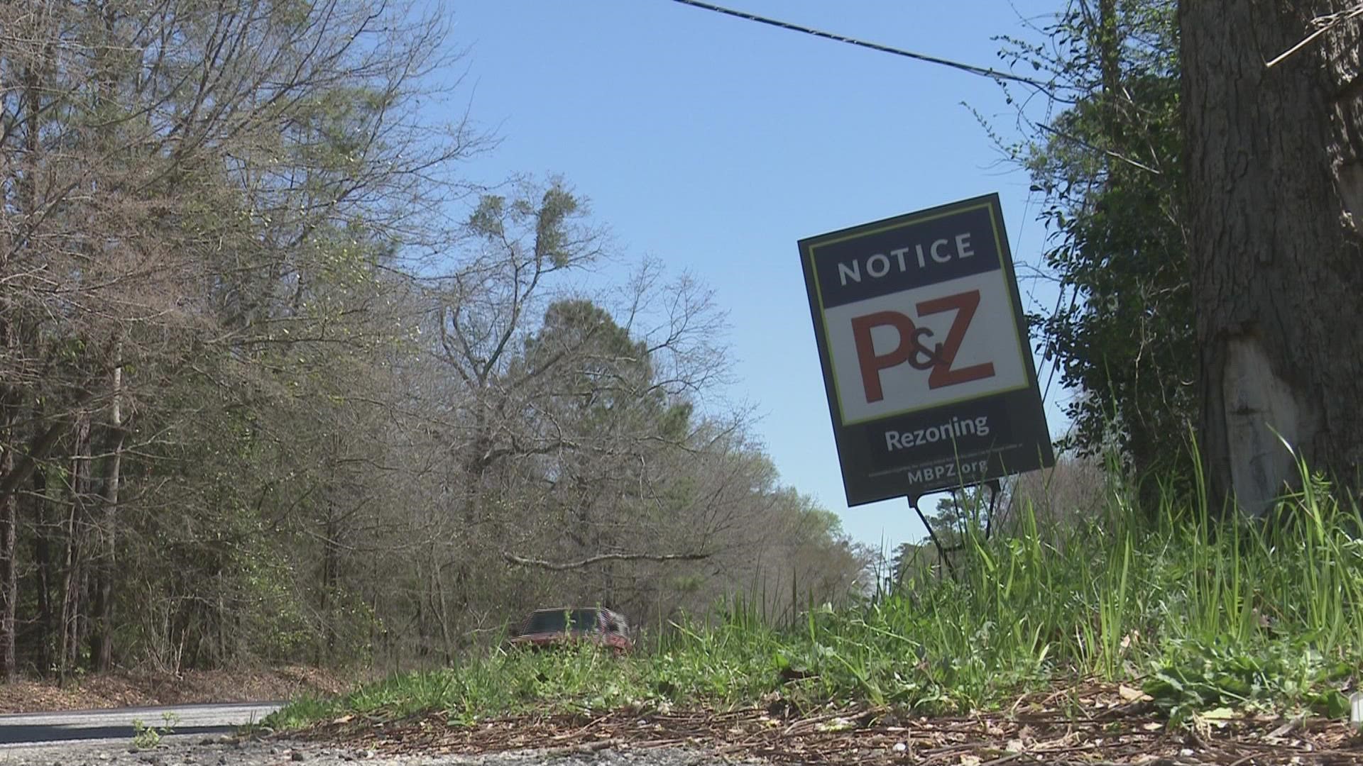 Residents of a subdivision in South Bibb County have a wooded buffer behind their homes and told the Macon-Bibb County zoning board they don’t want apartments on it.