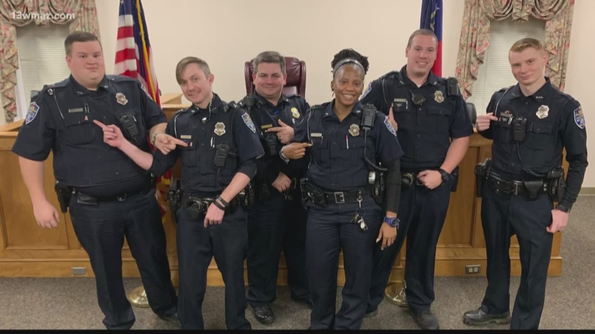 Milledgeville police raise awareness with breast cancer pins