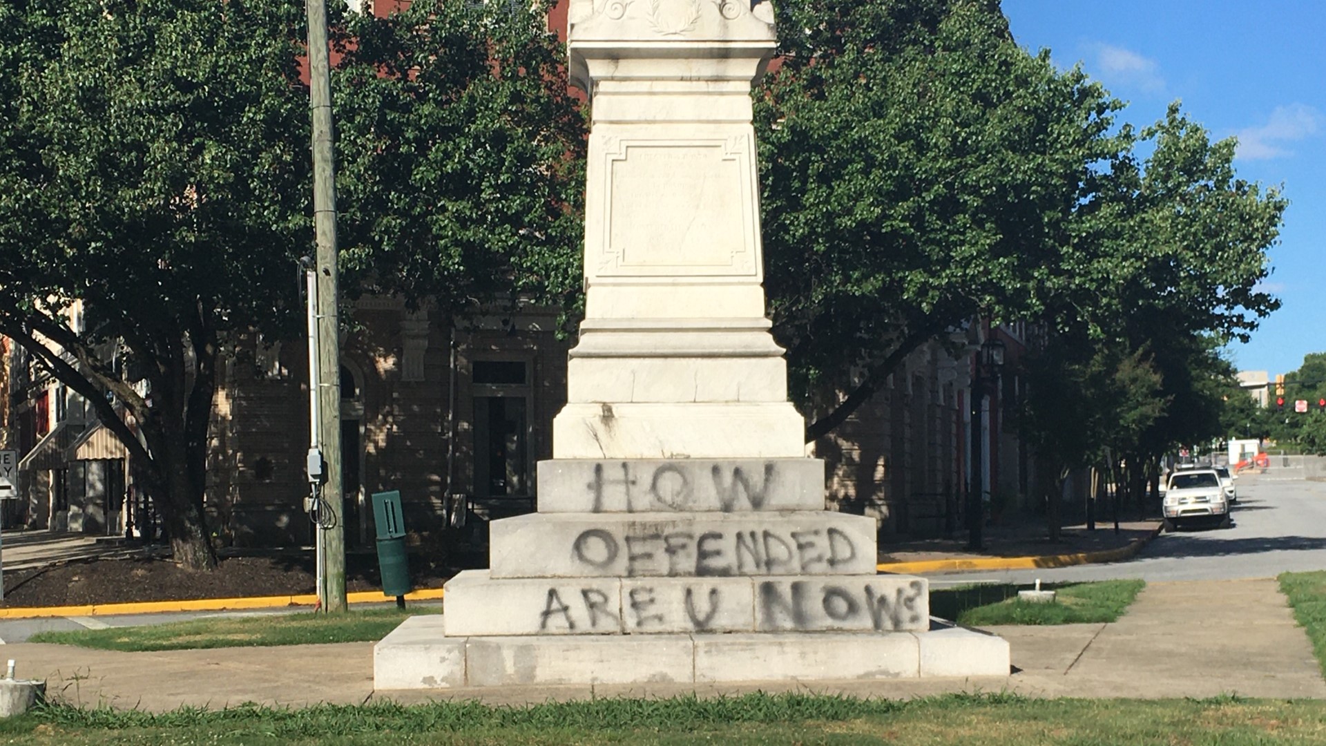 Crews are already cleaning up a message that reads 'How offended are you now?'