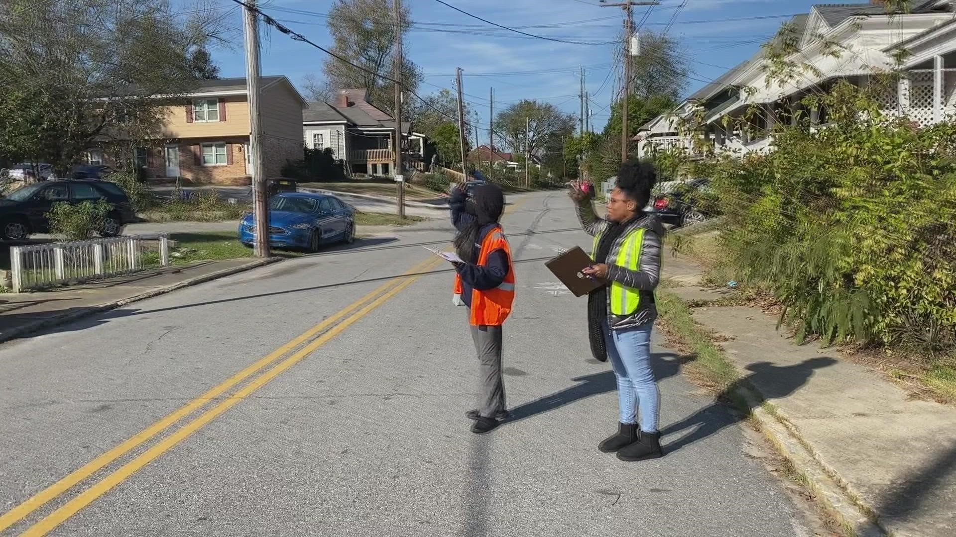 Volunteers walked street to street assessing what they say are vulnerabilities of properties for crime.