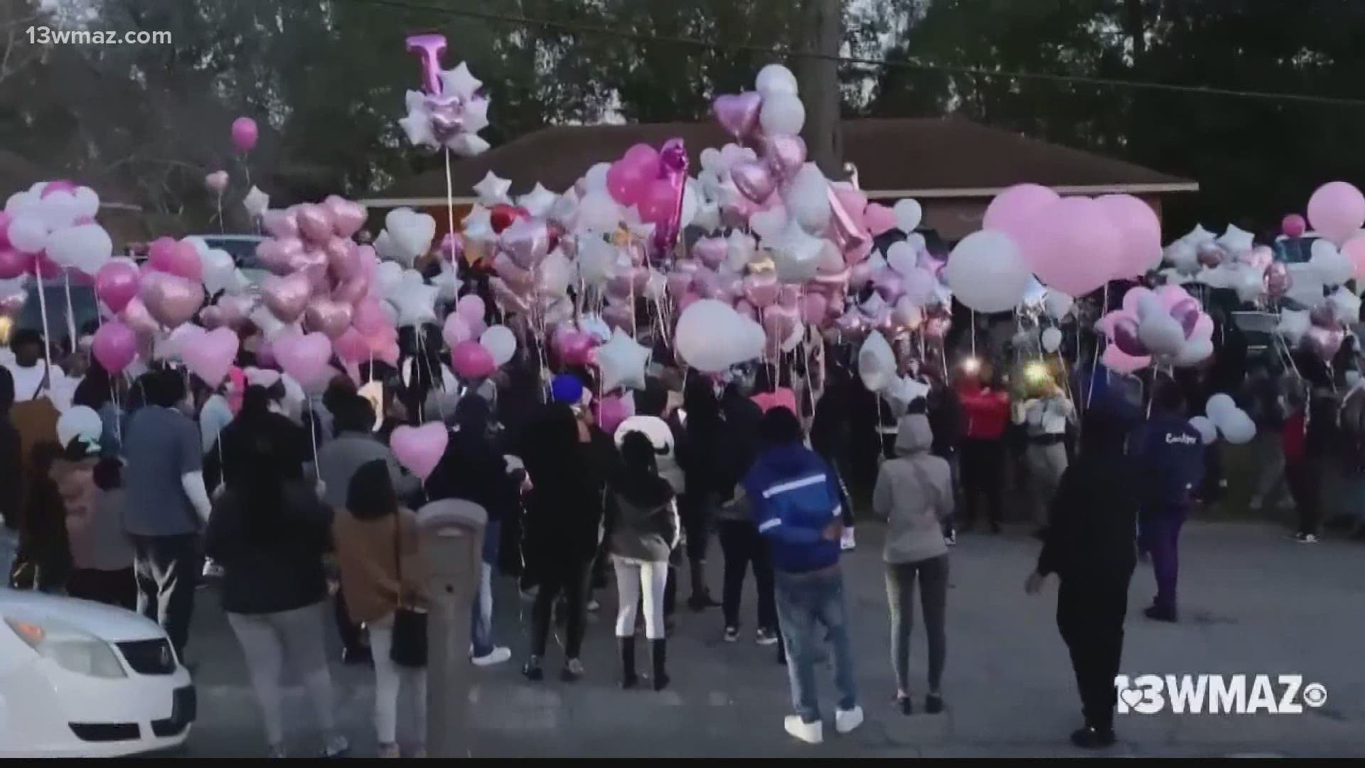 More than 100 people gathered to show their support for 22-year-old Jhacaya Mann and her family.