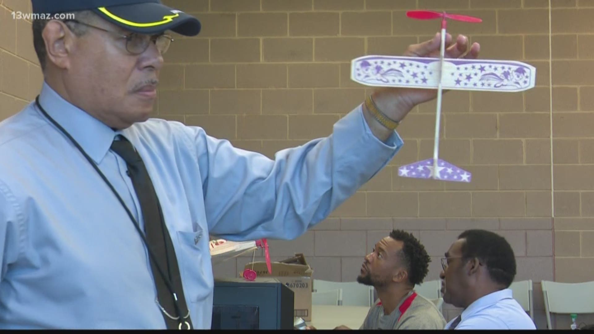 More than a dozen Central Georgia children spent Monday learning about aviation and engineering by building planes and rockets, and it was all thanks to the generosity of two Macon men.