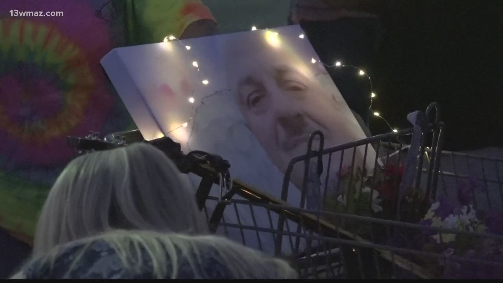 Dozens of people gathered outside of the Krispy Kreme on Watson Boulevard Sunday night to mourn the loss of veteran Roy Long.