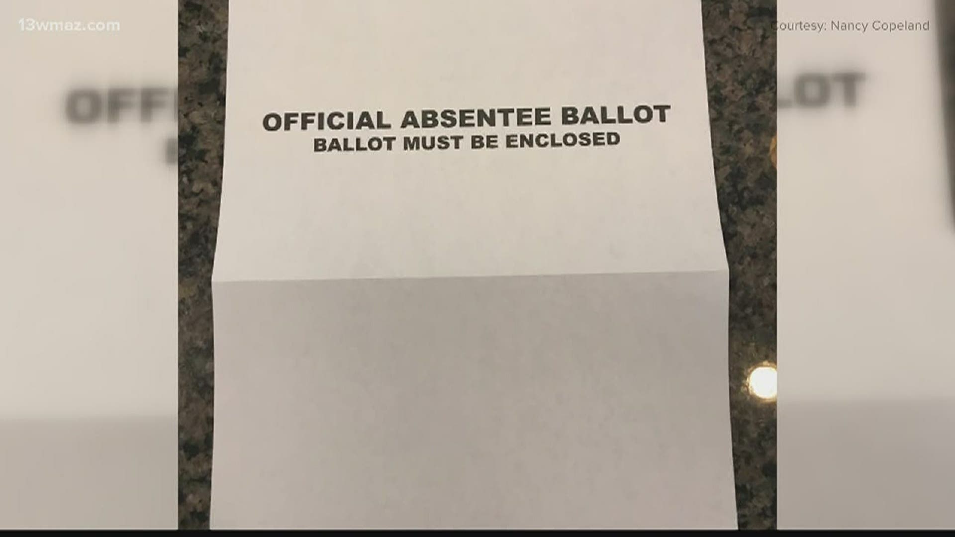 Instructions say to seal the absentee ballot in a white envelope. Instead, voters received a white piece of paper.