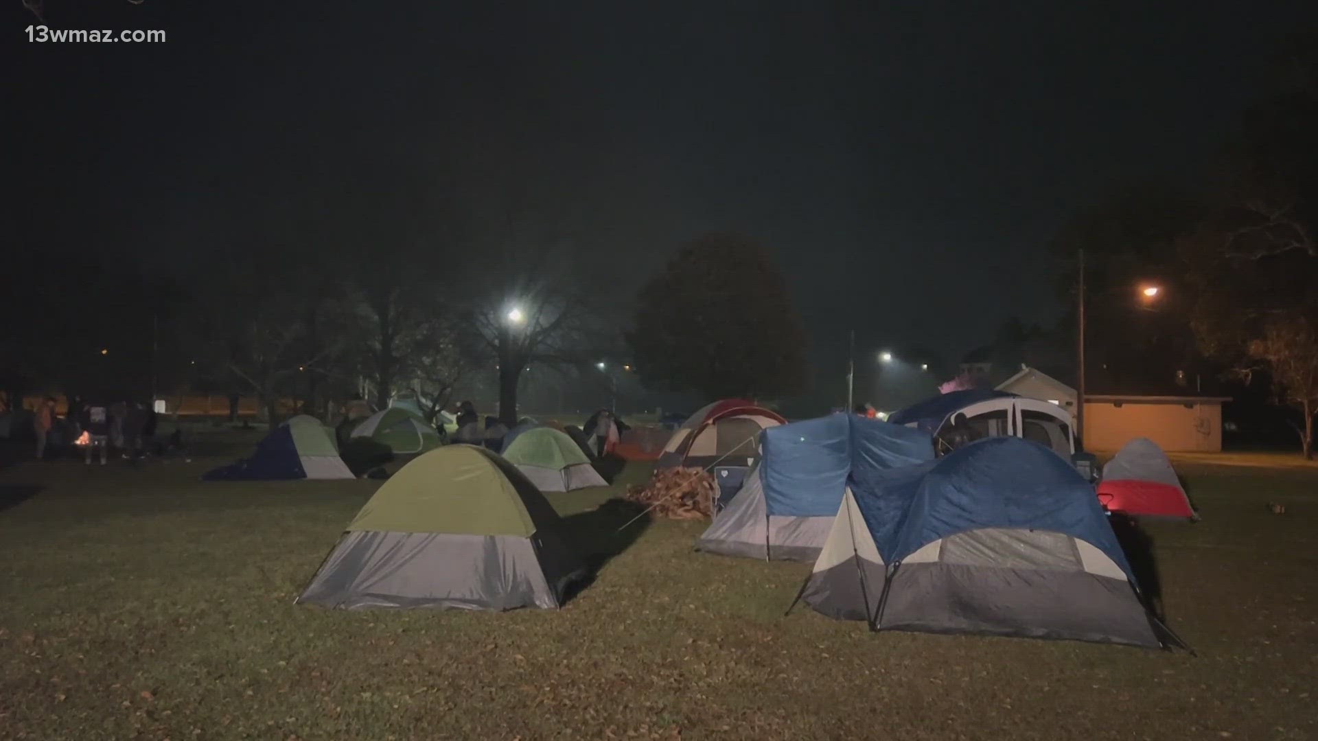 Dozens of people camped out Thursday night to simulate to a degree what living without a permanent address is like