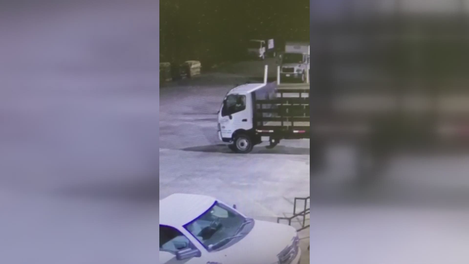 In a video released by the sheriff's office, the three wanted people are seen walking around some vehicles.