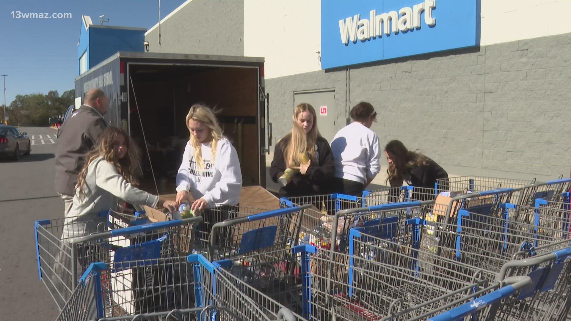 Schools, churches and various organizations in Warner Robins and Macon flocked out to donate various food items and help 13WMAZ stuff the truck ahead of the holidays