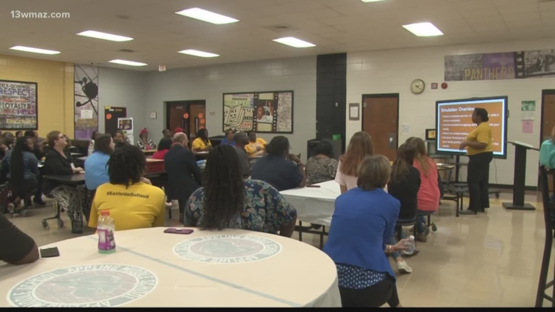 Appling Middle teachers go through 'poverty simulator'