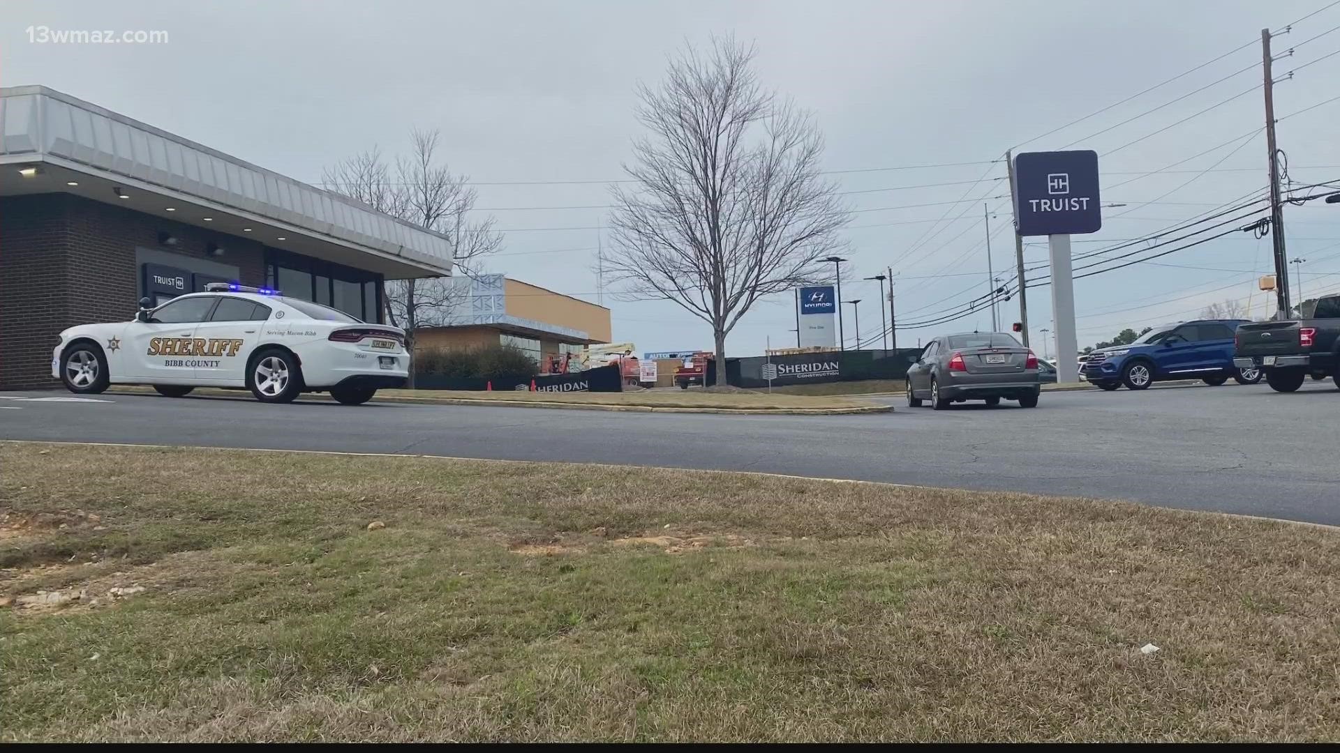 They say a man with a gun slid a note to the teller and robbed the Truist Bank on Riverside Drive.