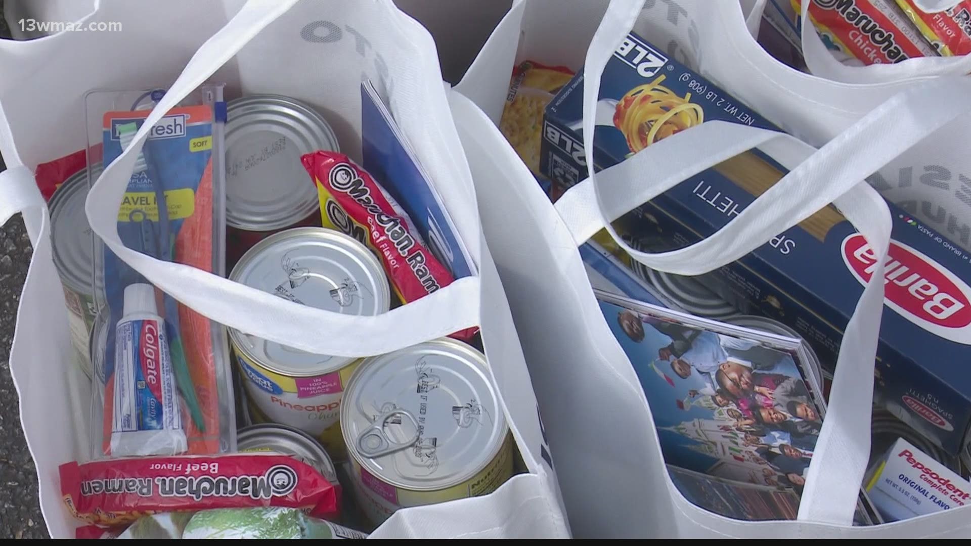 The Church of Christ held a free grocery drive-through event at the Motel 6 in Warner Robins on Saturday.