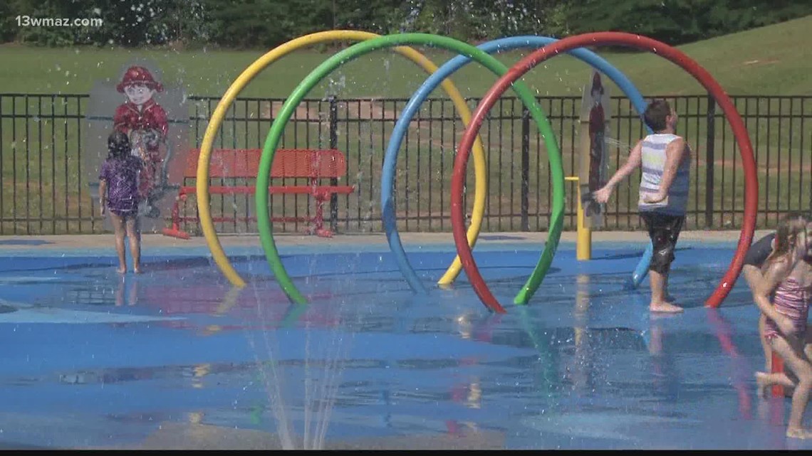 Summer is the perfect time to cool down in Central Georgia, including going to pools and splash pads. Here's when they open.