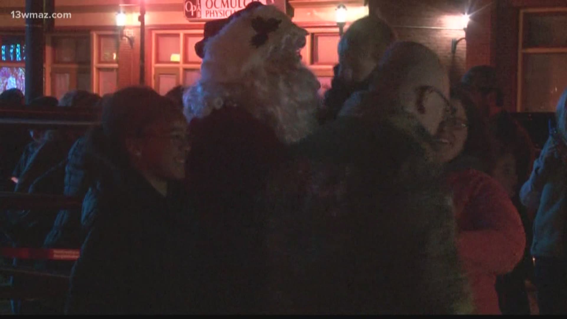 Santa stopped by on Saturday night along with his reindeer to take pictures with kids and their families on Poplar Street.