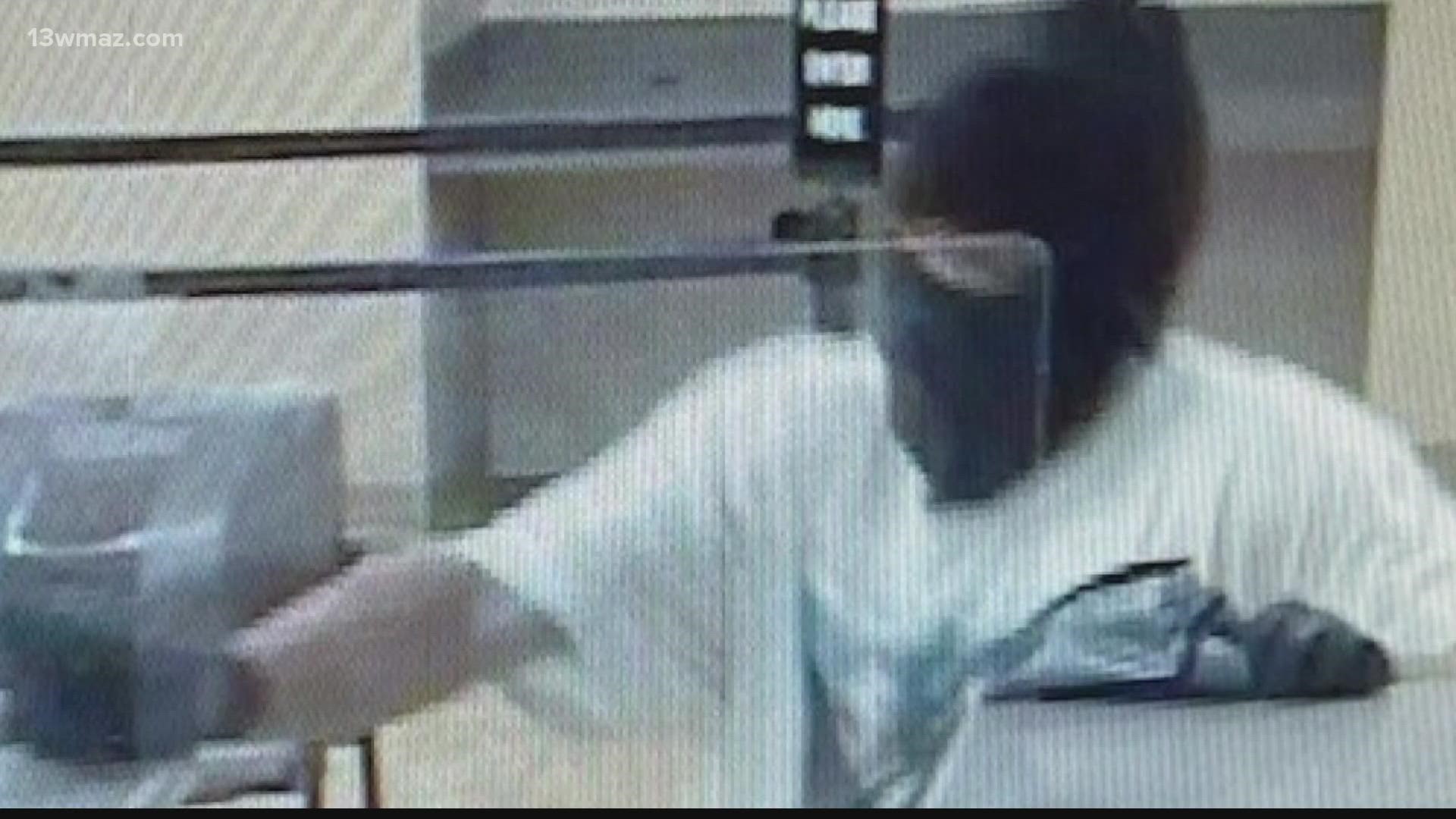The Warner Robins Police Department is looking for a man who robbed a bank and shot someone early Monday morning.
