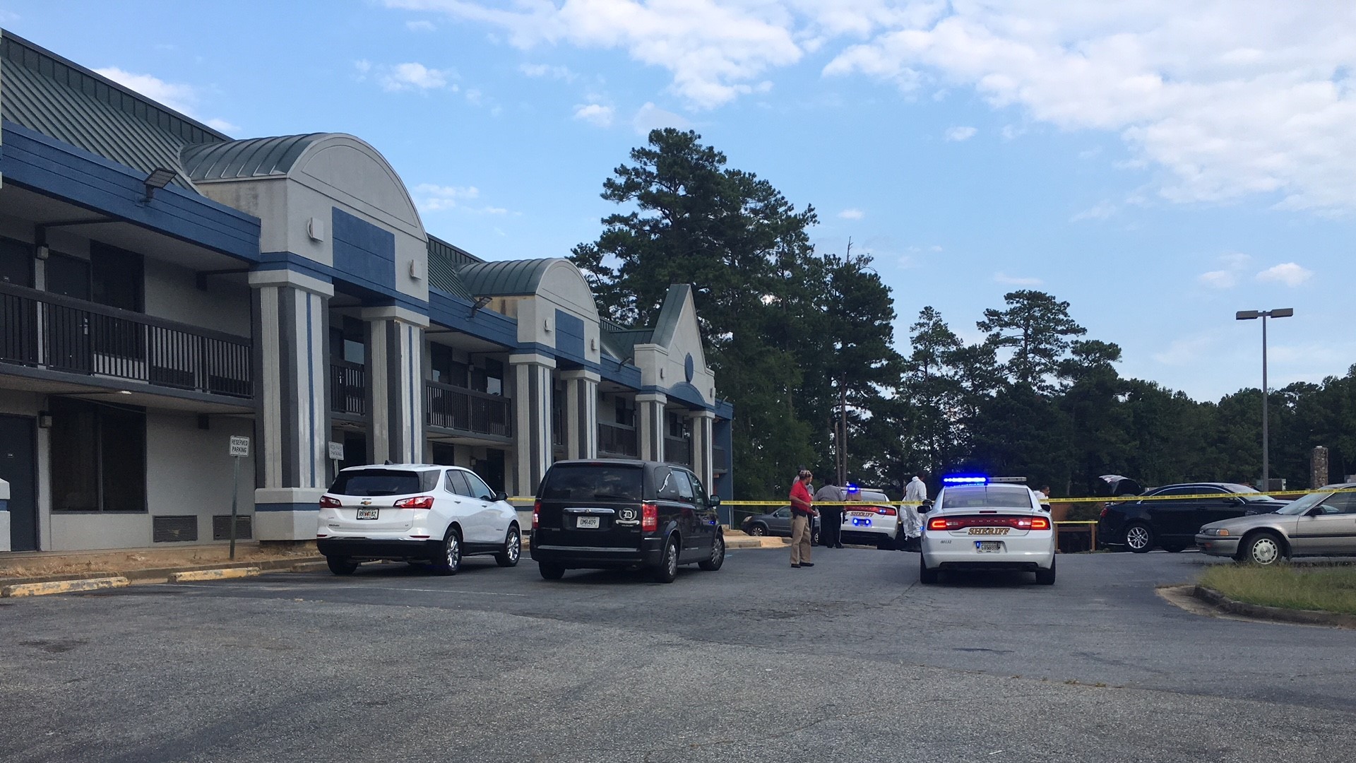 Bibb County Coroner Leon Jones says the woman was in a Lincoln Continental at the Haven Inn and Suites