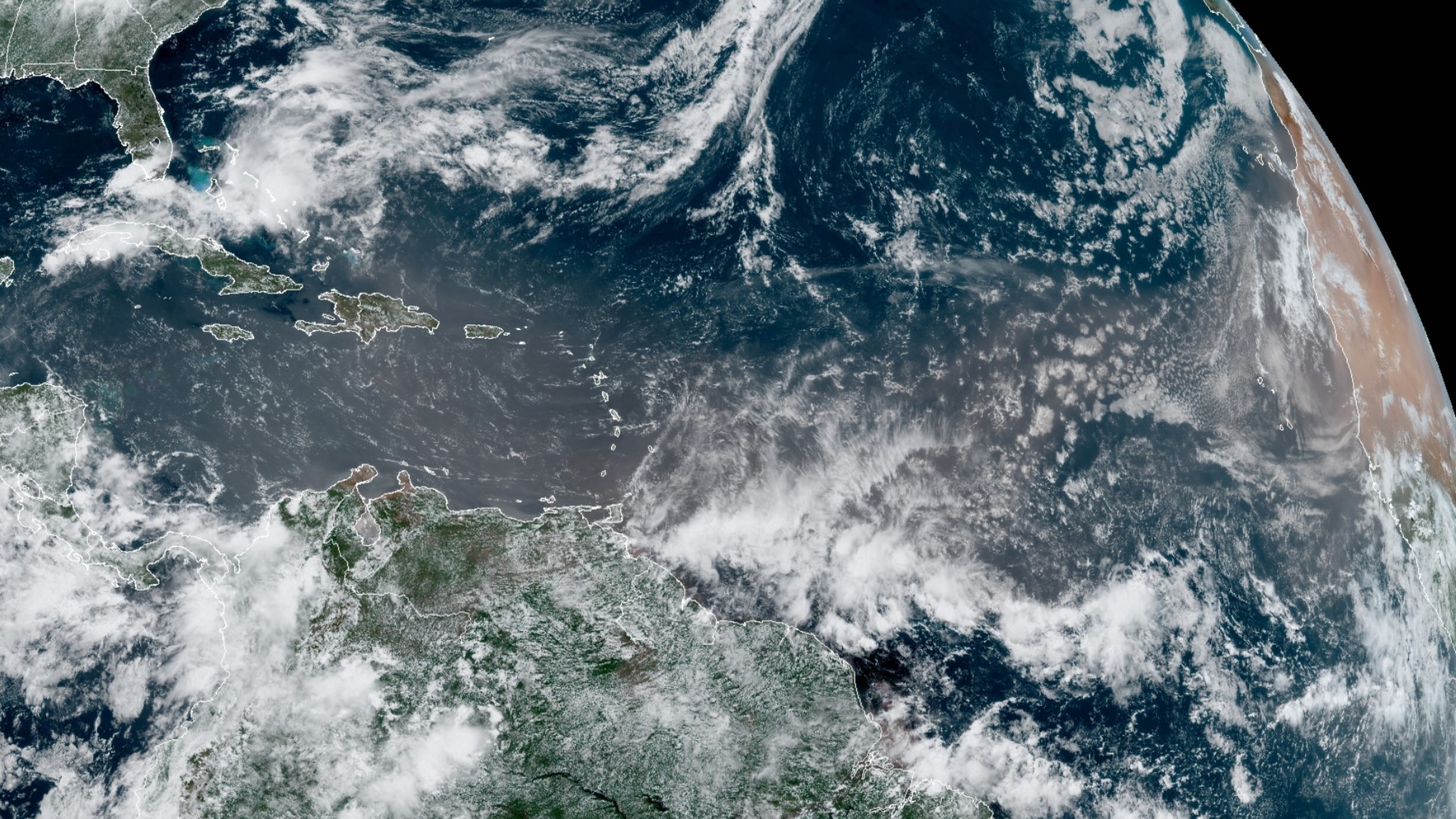 Dust clouds from thousands of miles away could pose health risks to many citizens, but also lessen early tropical activity and create gorgeous sunsets