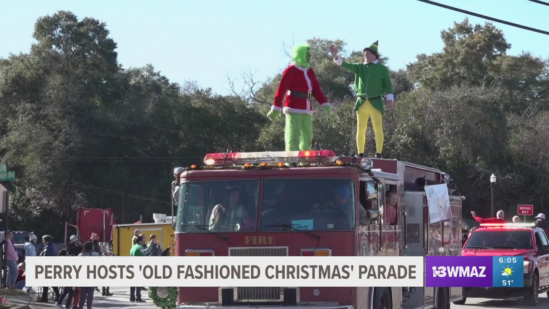 The parade featured multiple floats, and a live Grinch.