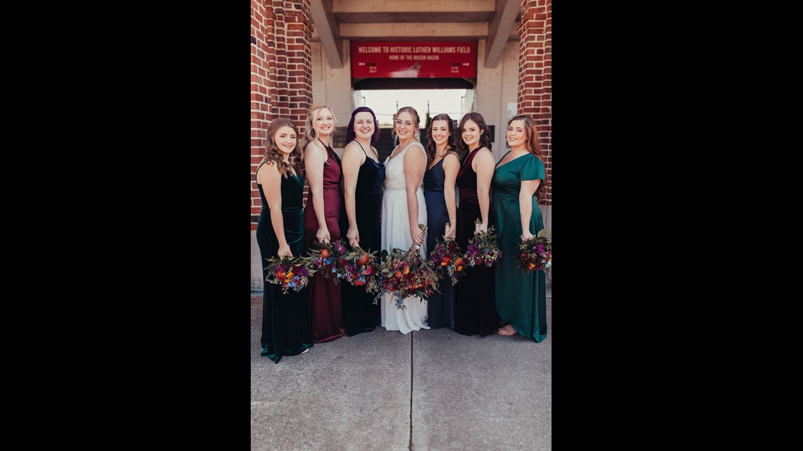 Macon couple gets married at Luther Williams field