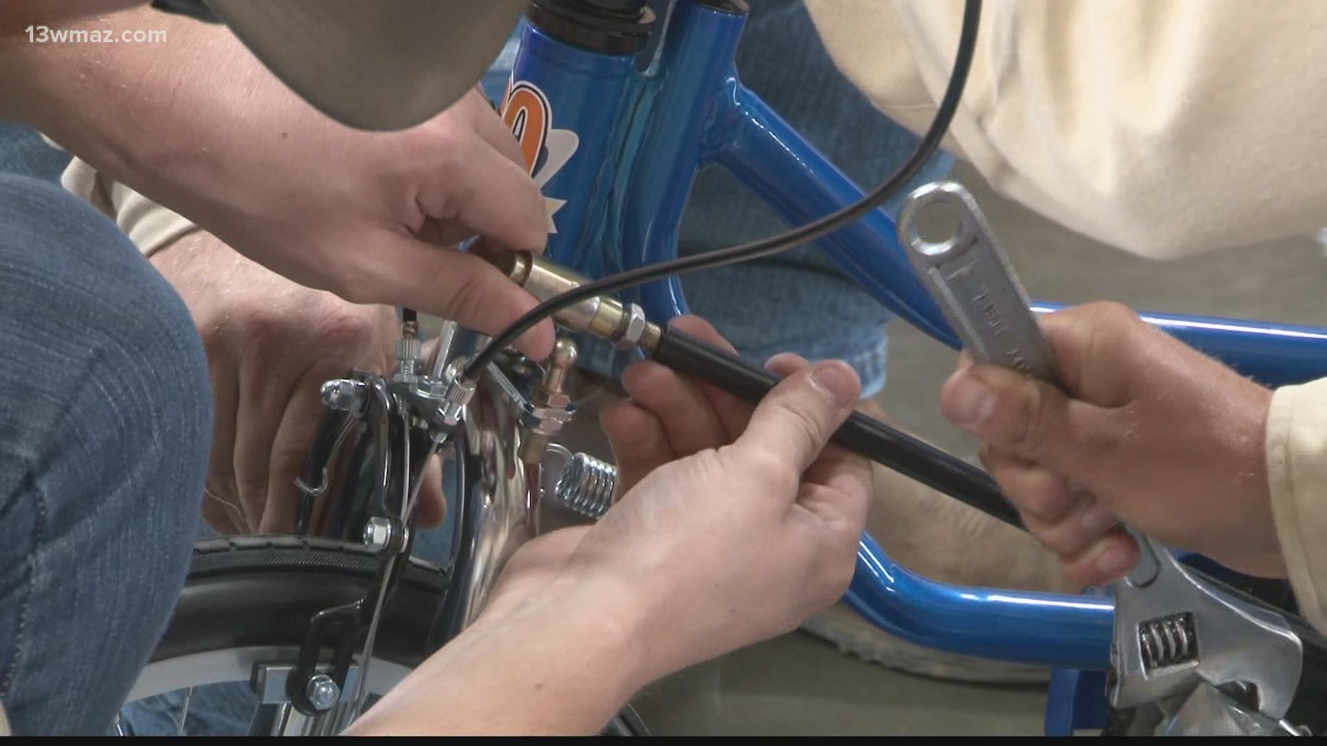 The group partnered with the Wellspring Wellness Center Tuesday to make the adaptive bikes for disabled children.