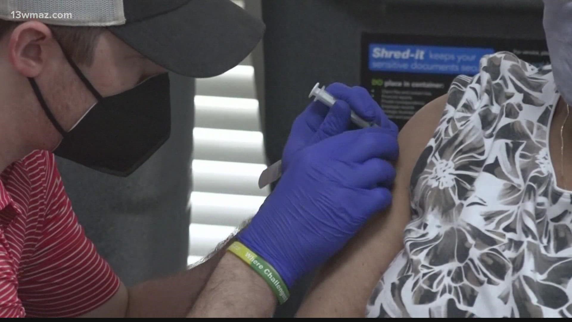 Macon-Bibb County commissioners voted 6-2 to pay full-time county employees $500 and part-time employees $250 who are vaccinated or chose to get vaccinated Tuesday