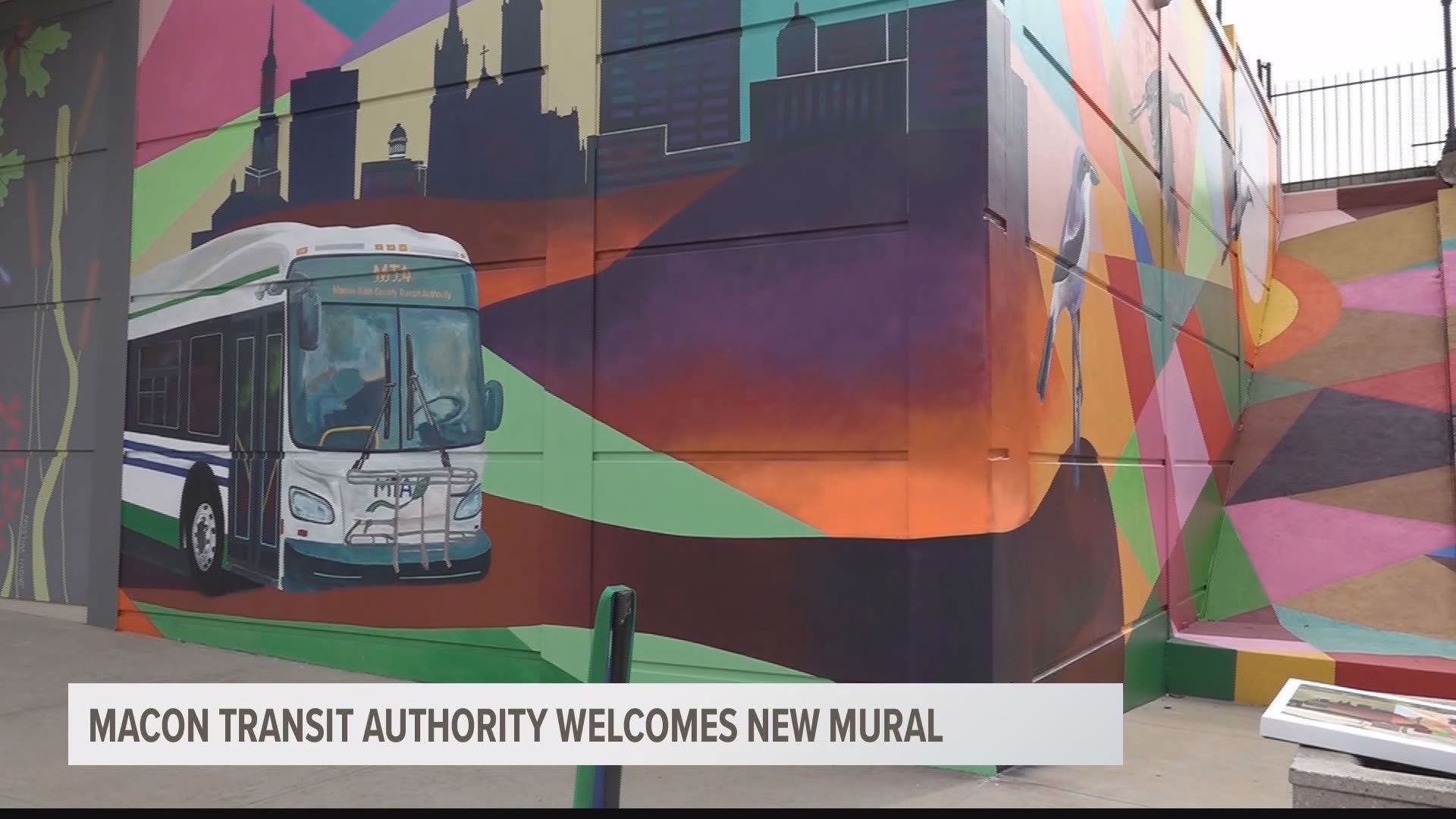 The artwork, which is the only wrap-around mural in Macon, completes the transfer station wall on Fifth and Poplar Street.