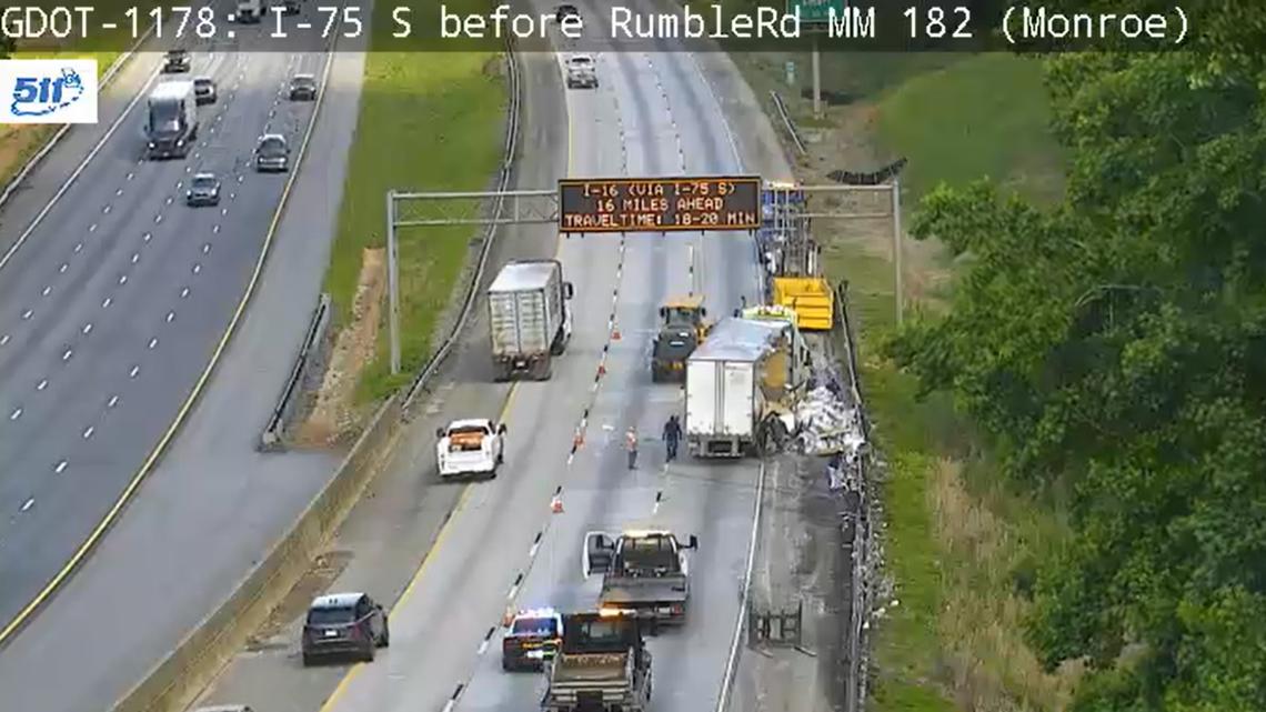 Traffic Alert: Trailer carrying glass bottles overturns on I-75 South in Monroe County, prompting clean-up effort