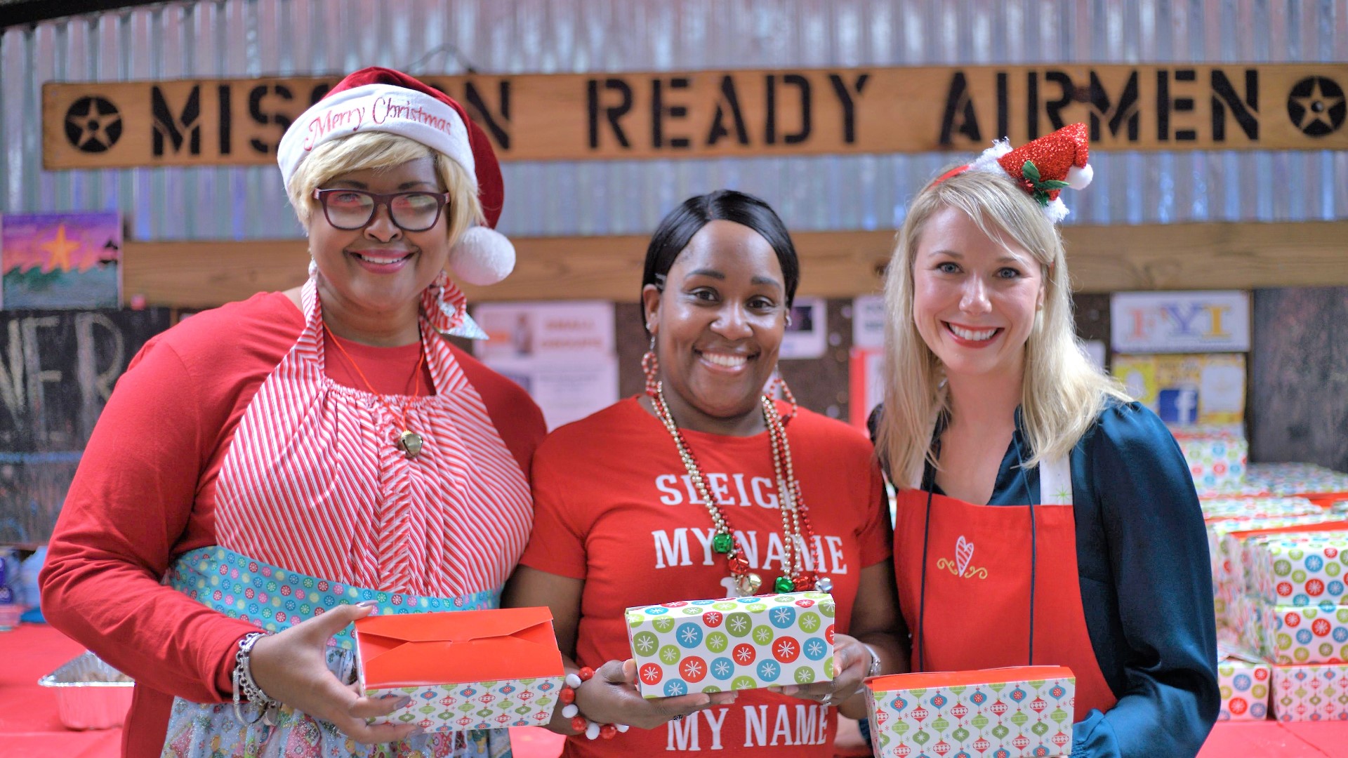 The Robins Spouses Club packed and assembled boxes of cookies. Those cookies were hand-delivered to all the Airmen in the dorms