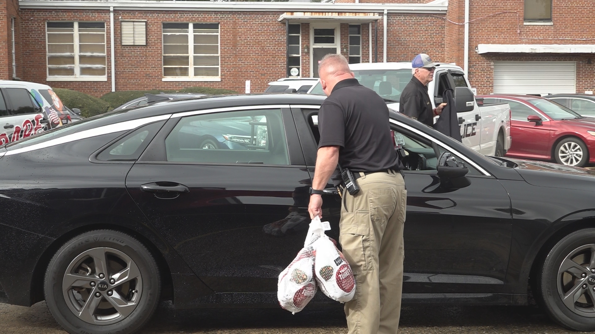 Tuesday, the Fort Valley Police Department distributed 300 turkeys to residents outside of their police headquarters.