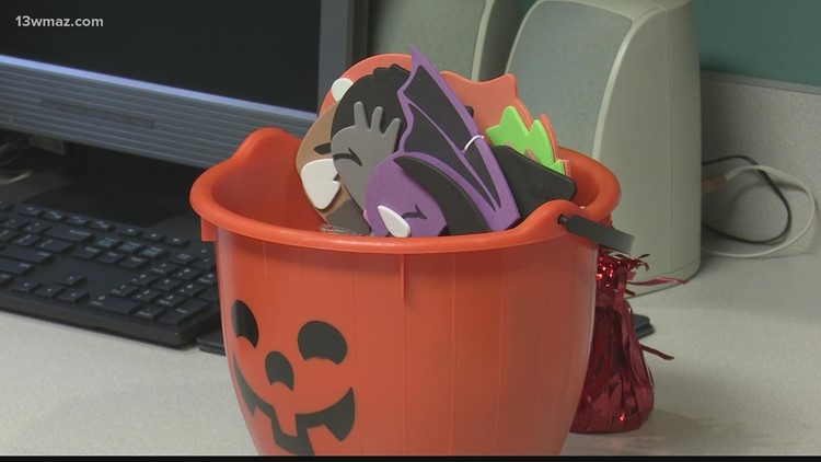 Bibb County dentist buys Halloween candy from children