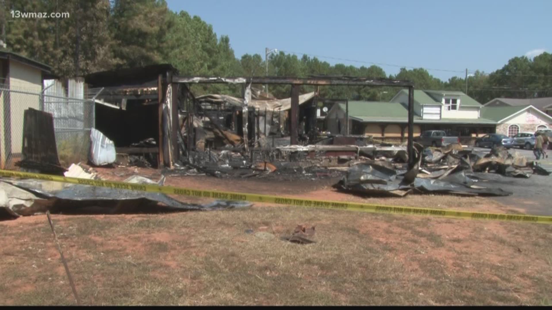 A Monroe County man killed himself at his ex-wife's house hours after a suspicious fire destroyed a bar he co-owned.