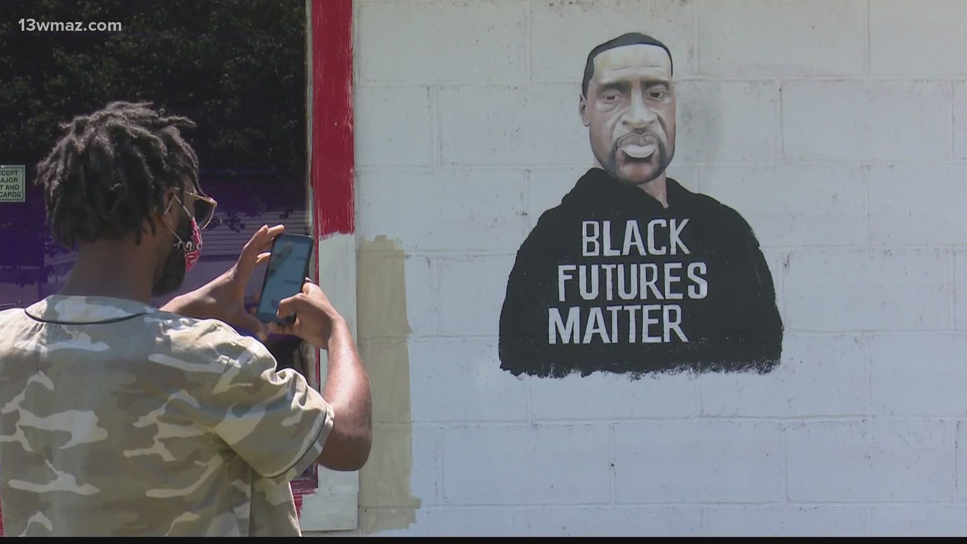 It took Asad Thomas four days to complete a mural of George Floyd, a Minnesota 46-year-old who died after an encounter with police in May.