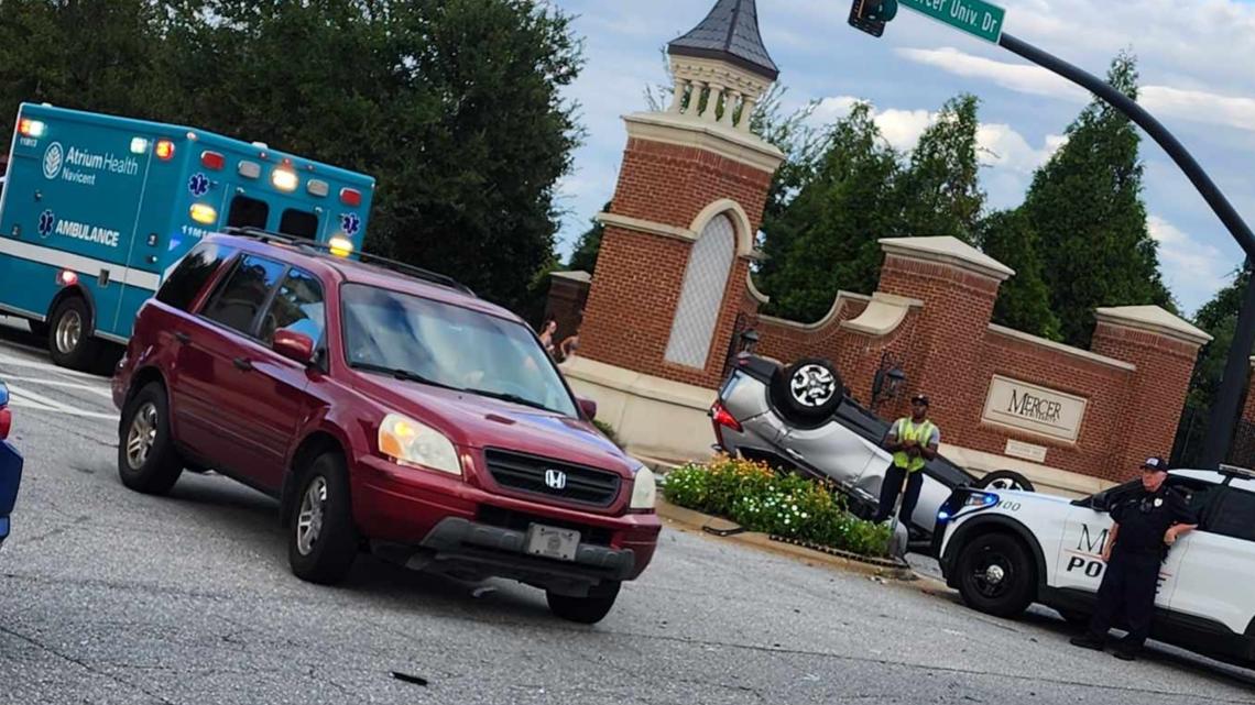 Car flips over on Mercer University Drive, per report