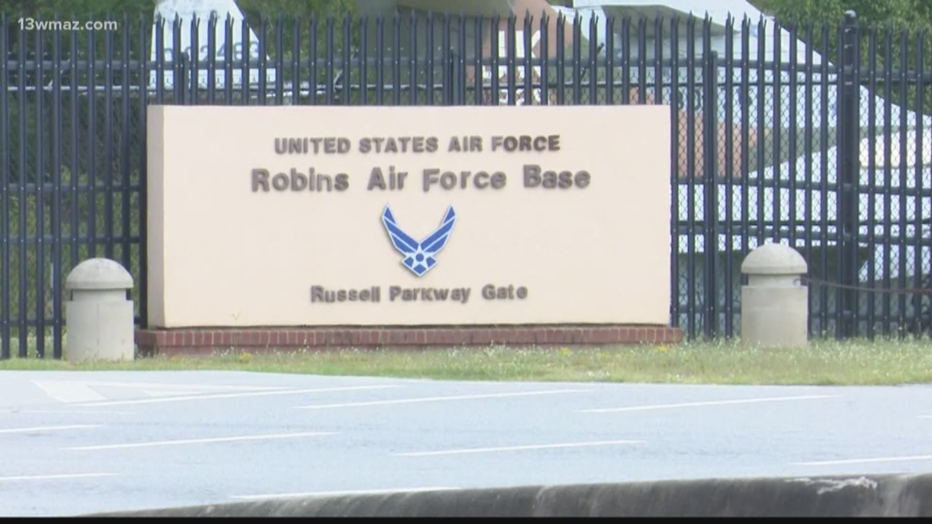 Robins AFB officials say the three men drove through the gate after bypassing security and crashed into a barrier